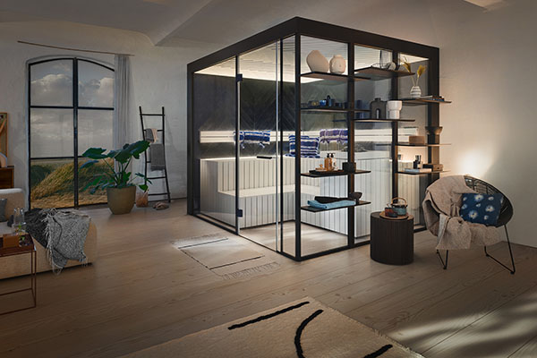 Luxuriöse Sauna steht in modernem Raum, umgeben von stilvollen Möbeln und großen Fenstern.