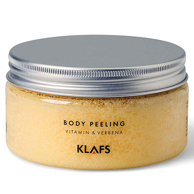 Creme-Dose – steht ruhig – auf weißem Hintergrund, Aufschrift: "Body Peeling Vitamin & Verbena KLAFS".